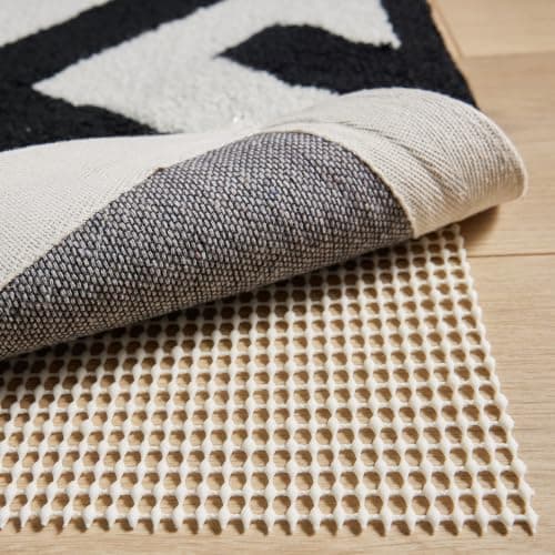 GORILLA GRIP® Strong Rug Pad Gripper, 2x8 FT, US Designed, Grips Help Keep Area Rugs Safe and in Place, Slip and Skid Resistant Pads for Hard Floors, Under Carpet Mat Cushion and Hardwood Protection